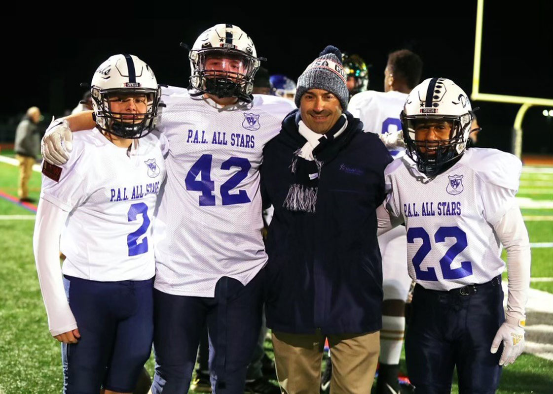 Huntington alum Dr. James Paci with the Blue Devil All-Stars.