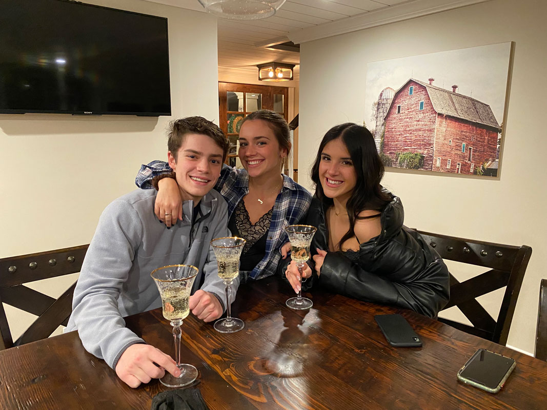 Jillian LoTurco shares the good news with friends Dylan Coleman and Margo Nitekman.