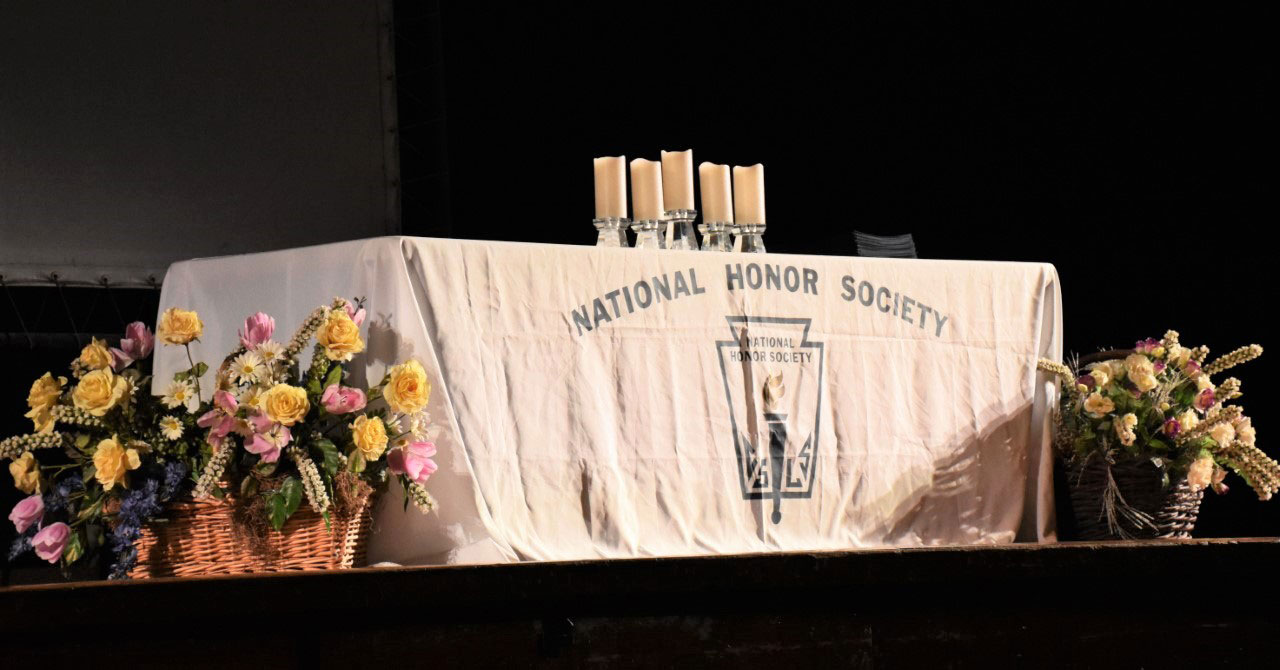 Huntington High School's National Honor Society chapter has been inducting top scholars for 65 years.