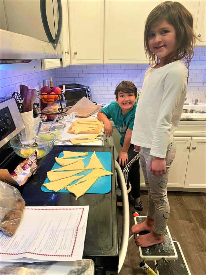Rylan (foreground) and Austin Roberts in the kitchen during the big event.