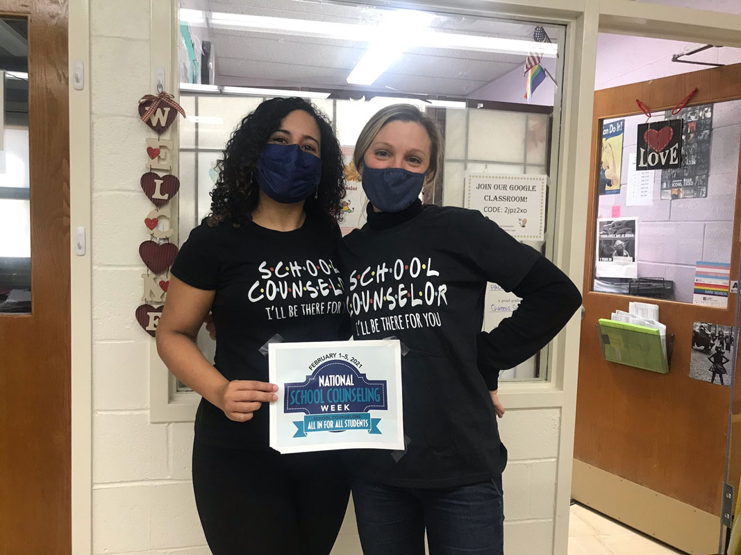 Huntington faculty and staff members donned college apparel to help promote discussion