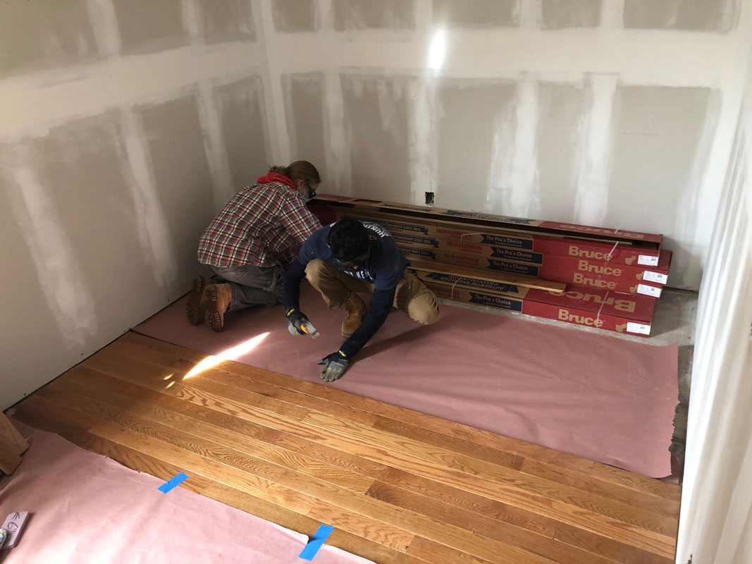 The Huntington Habitat members installed wood flooring in two rooms.  