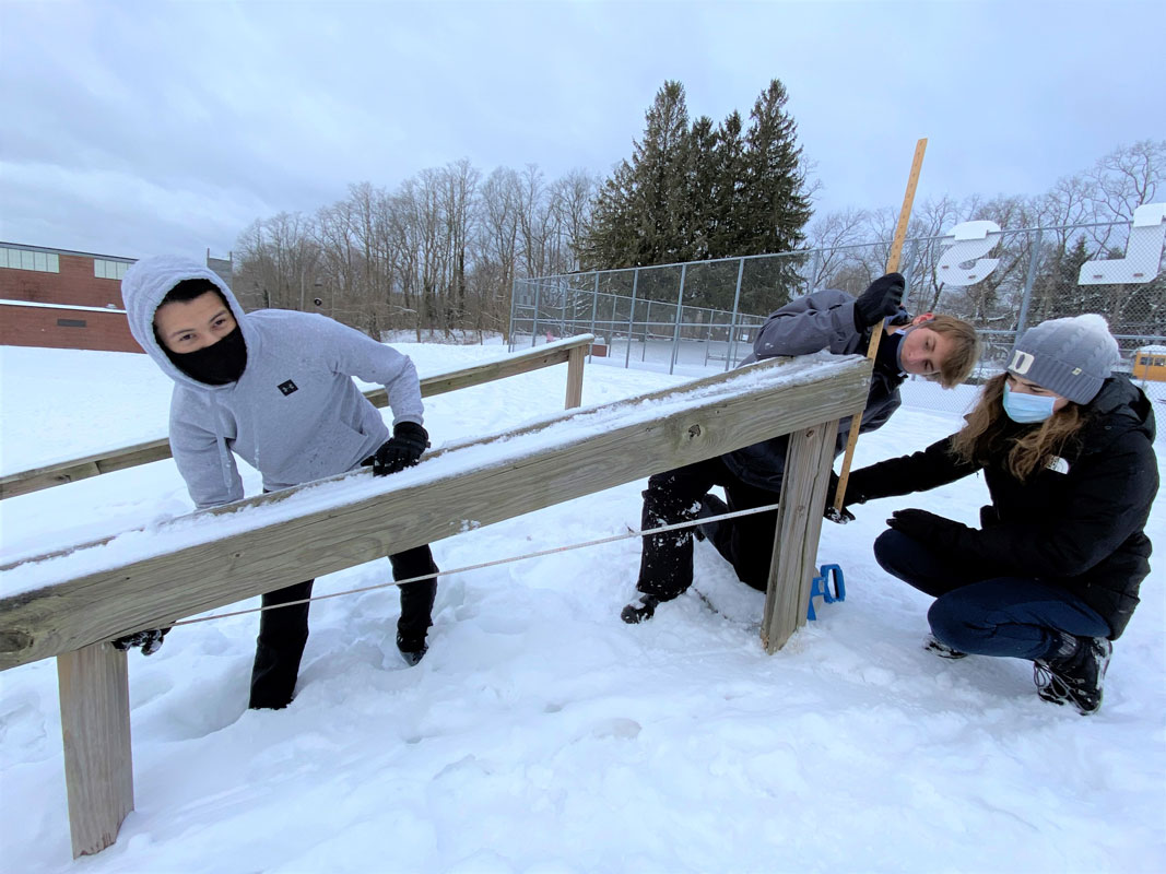 Taking measurements and making calculations were part of the outdoor lesson.