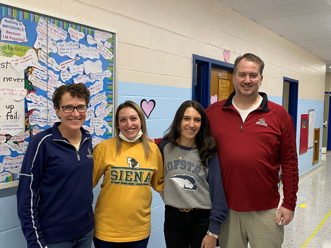 Huntington faculty and staff members donned college apparel to help promote discussion