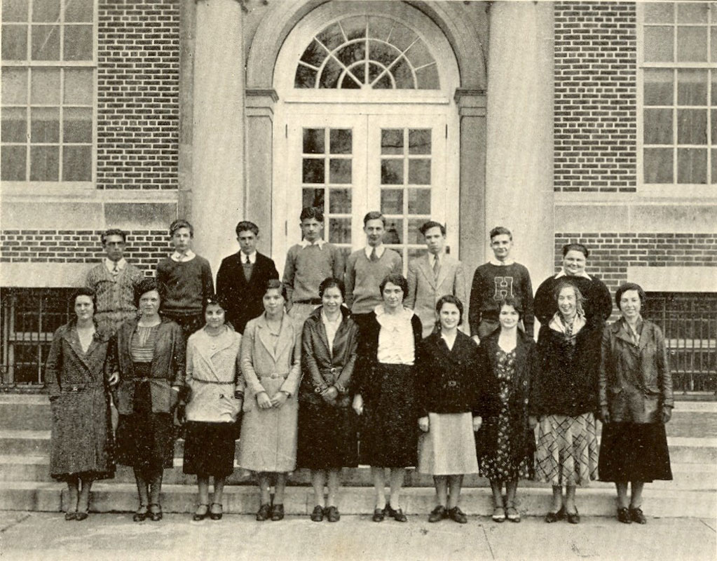 Huntington High School's 1931 debate club members near the front entrance to the building.
