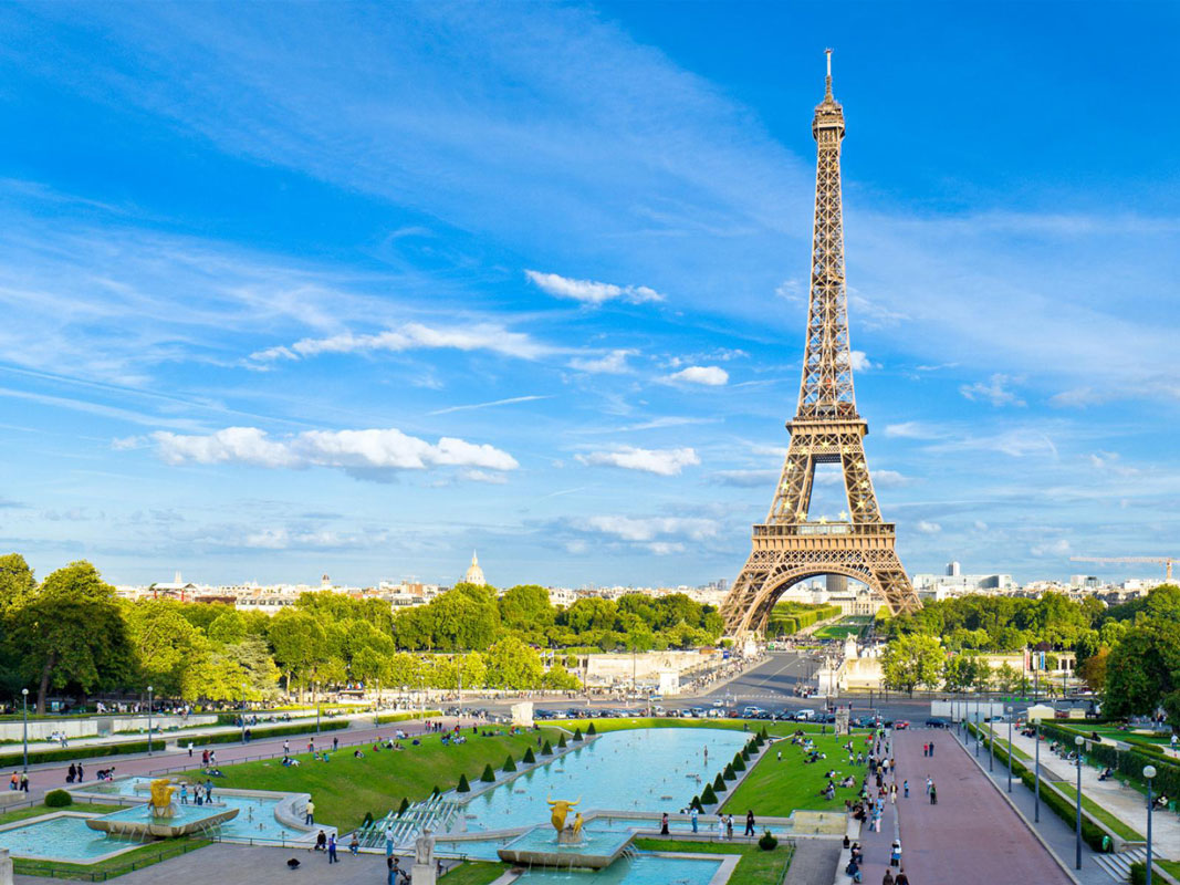 The Eiffel Tower in Paris, France is one of the world's biggest tourist attractions 