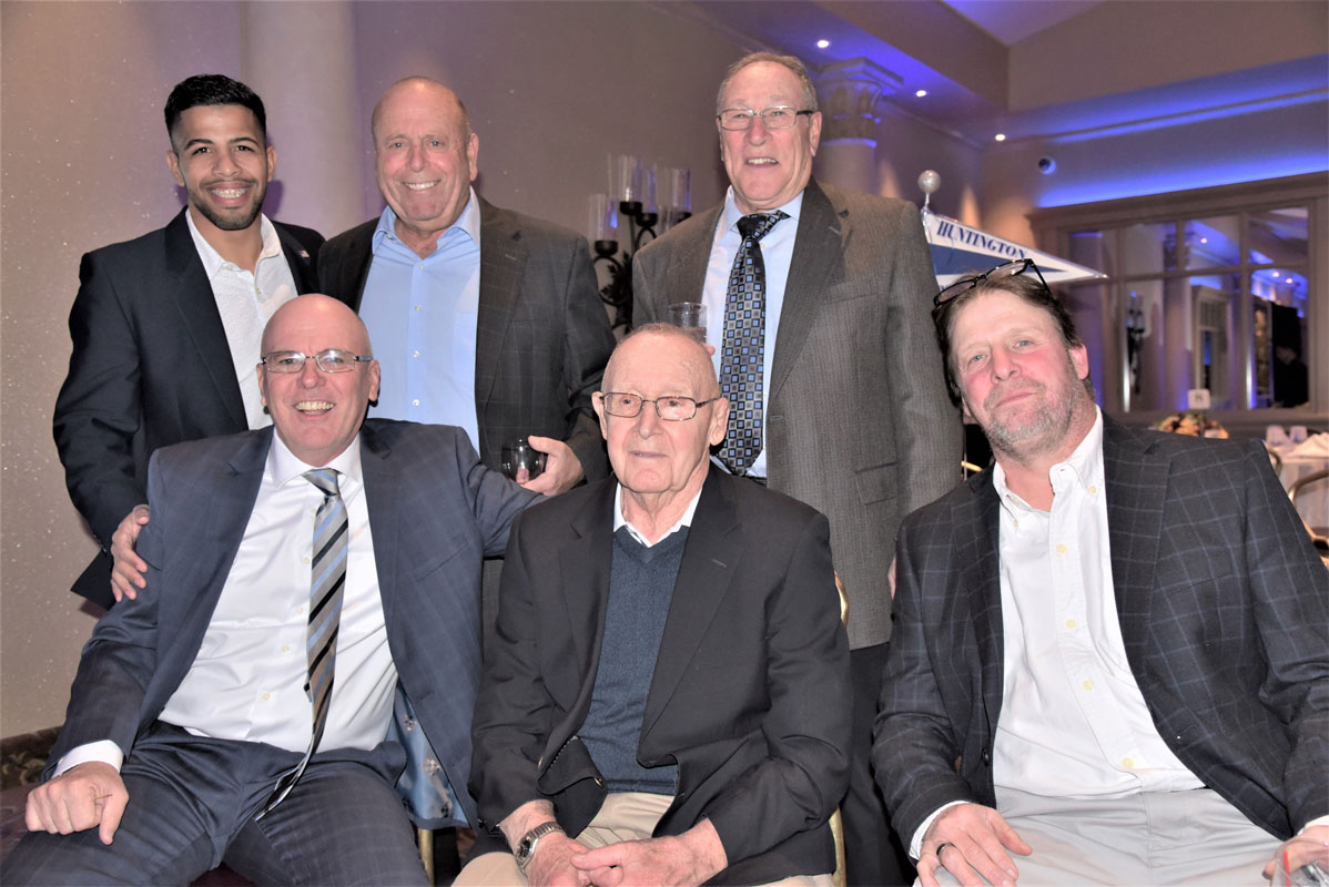 Lou Giani (center front) with fomer colleagues and wrestlers at a Huntington Booster Club dinner in 2018.