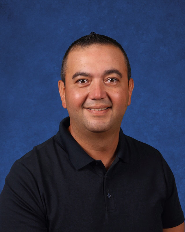 Edward Florea is the faculty advisor for the high school's student newspaper and news website.