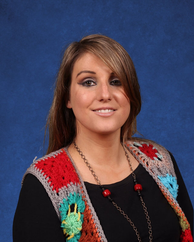  Huntington social studies teacher Debora Balducci is the debate club's faculty advisor. 