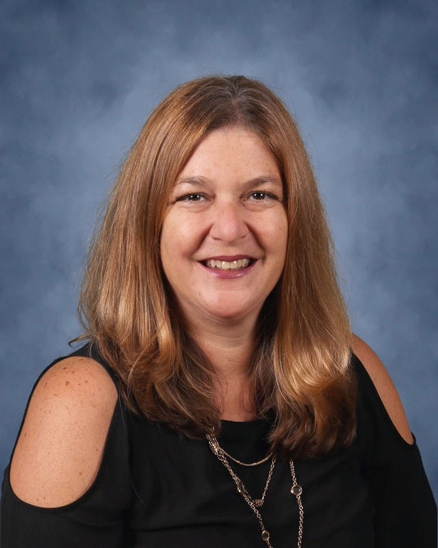 Huntington teacher Nadine Araoz is the Spanish Honor Society's faculty advisor.
