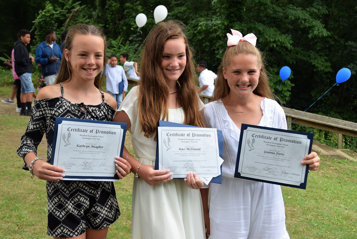 Kathryn Meagher, Kaci McDonald and Gianna Forte on graduation day at Woodhull Intermediate School.