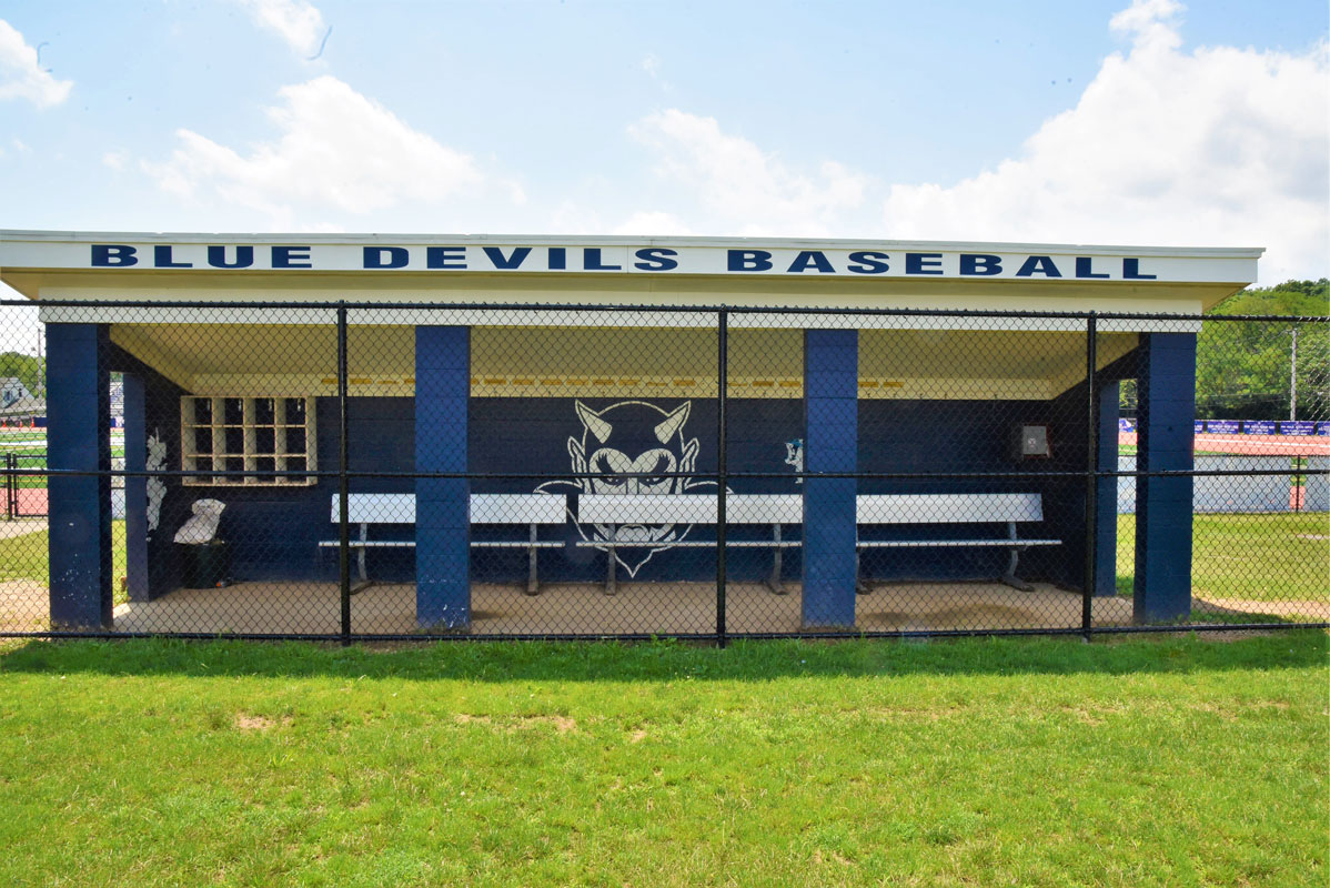 The new fence protects the Blue Devil dugout area.