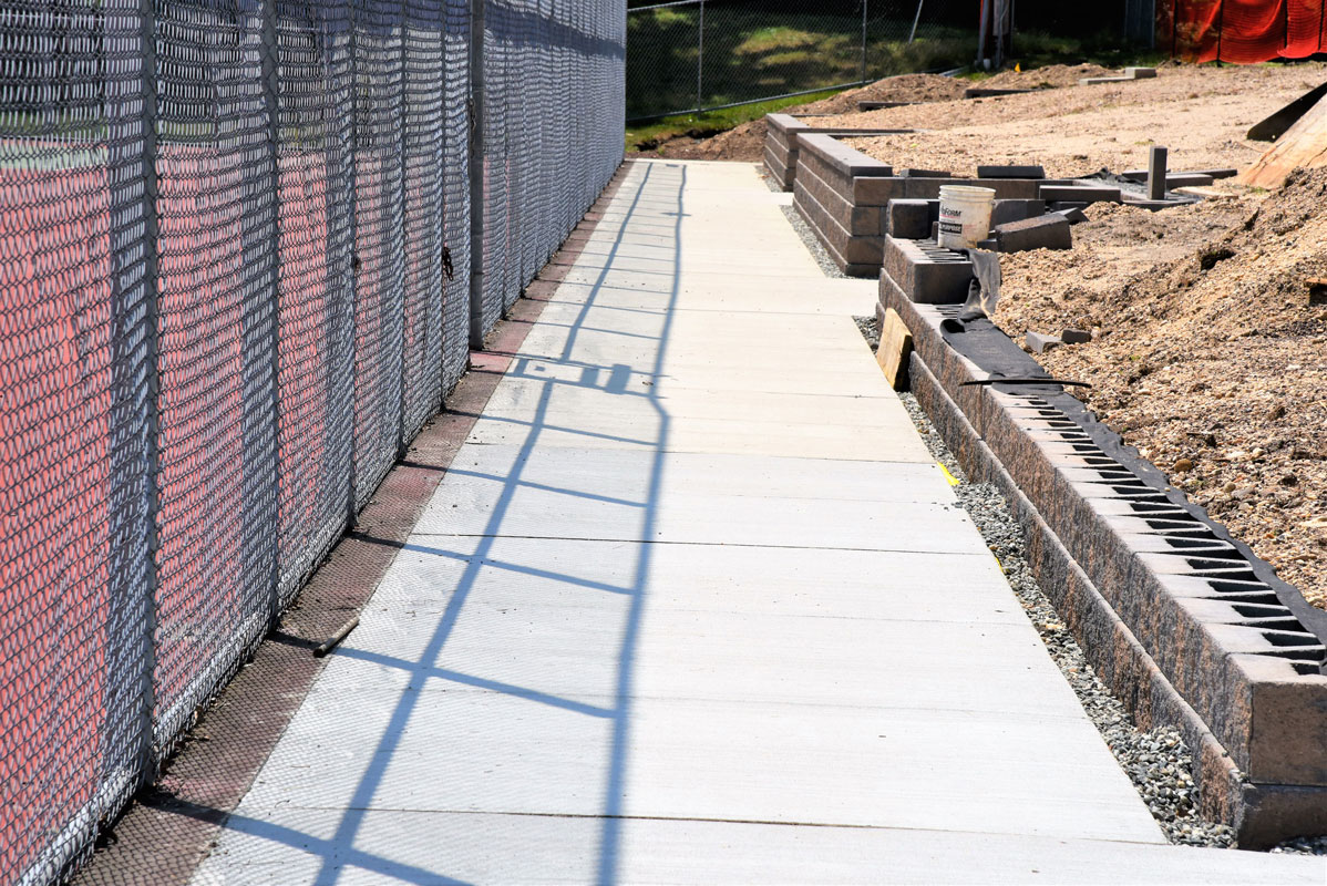 A seven foot wide walkway along the outside of the court complex has been installed.