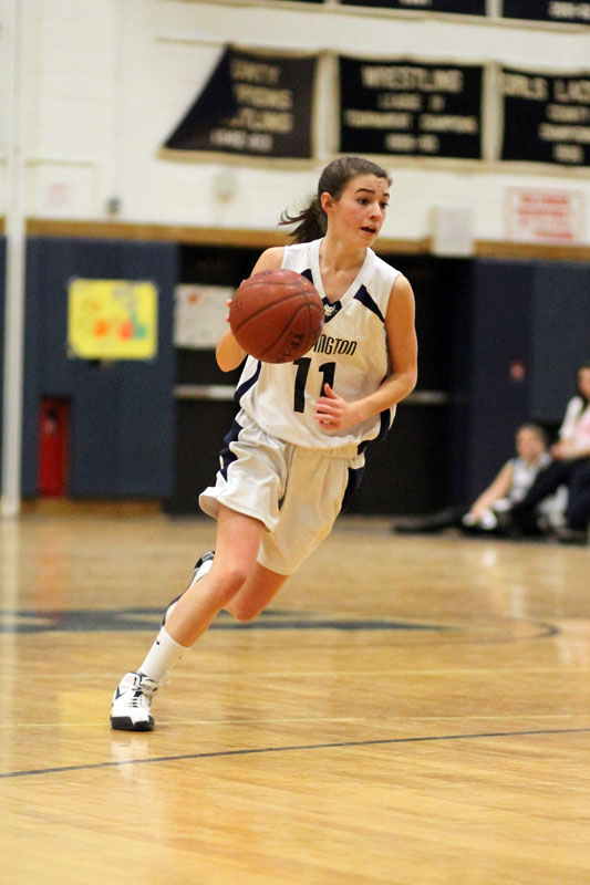 Courtney O'Bryan drives for the basket. (Photo by Mike Connell.)