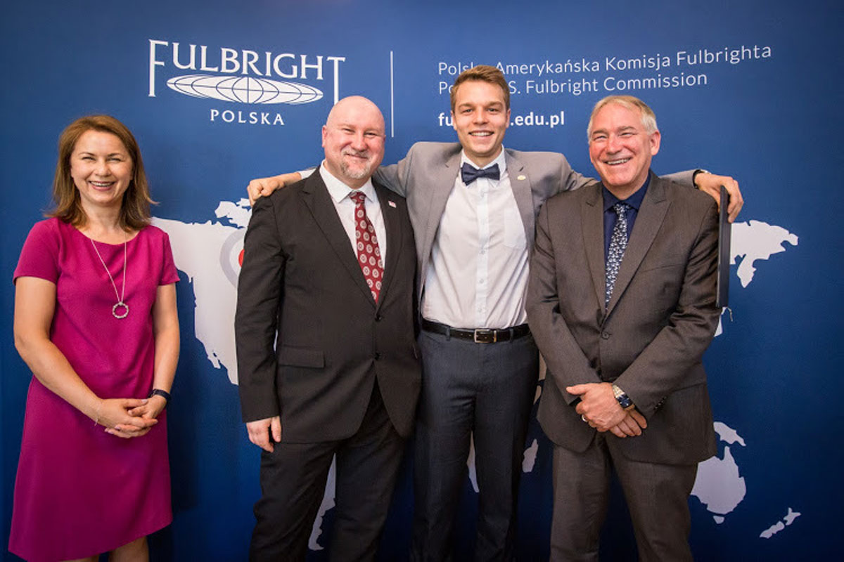 Michael S. Gilmor (second from left) with university and Fulbright officials in Poland.