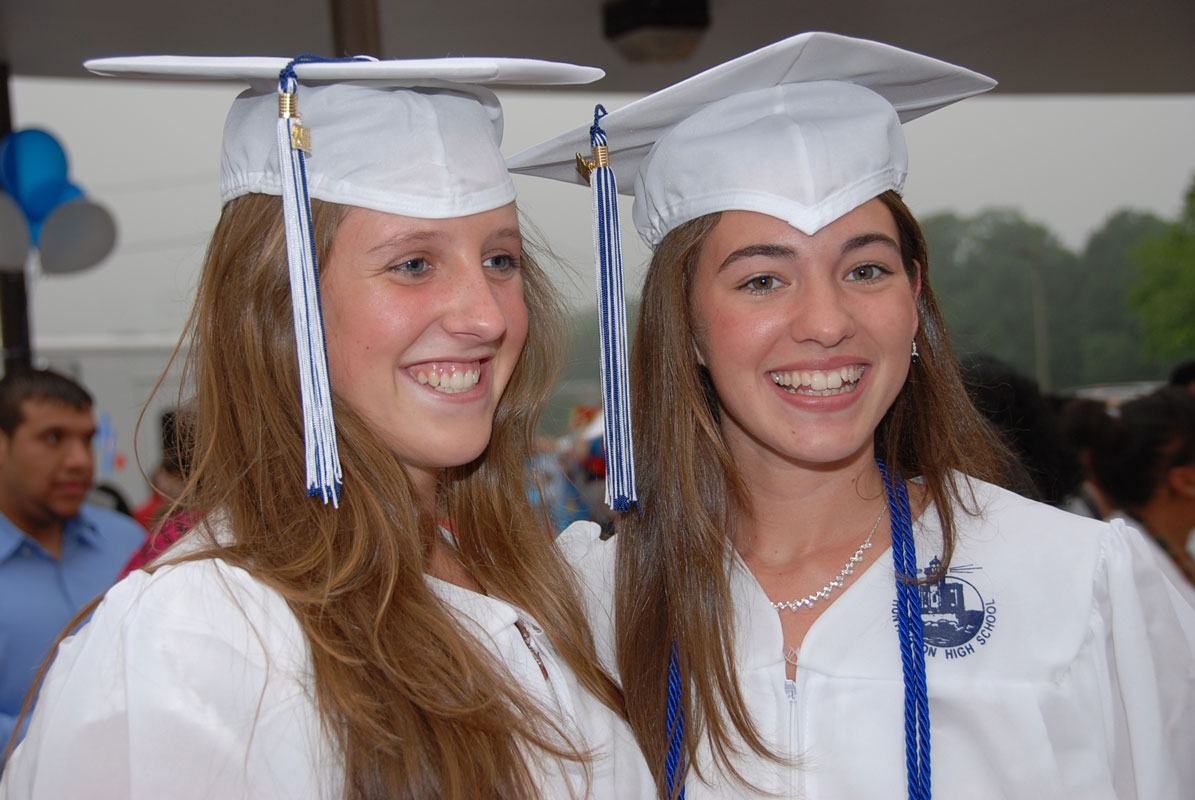 Teammates Emma Hayes-Hurley and Courtney O'Bryan on graduation day in June 2011.