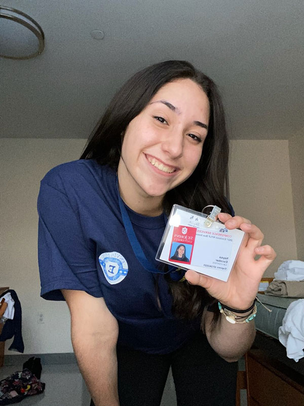Naysa Escobar with her St. John's summer business innovation program ID. 
