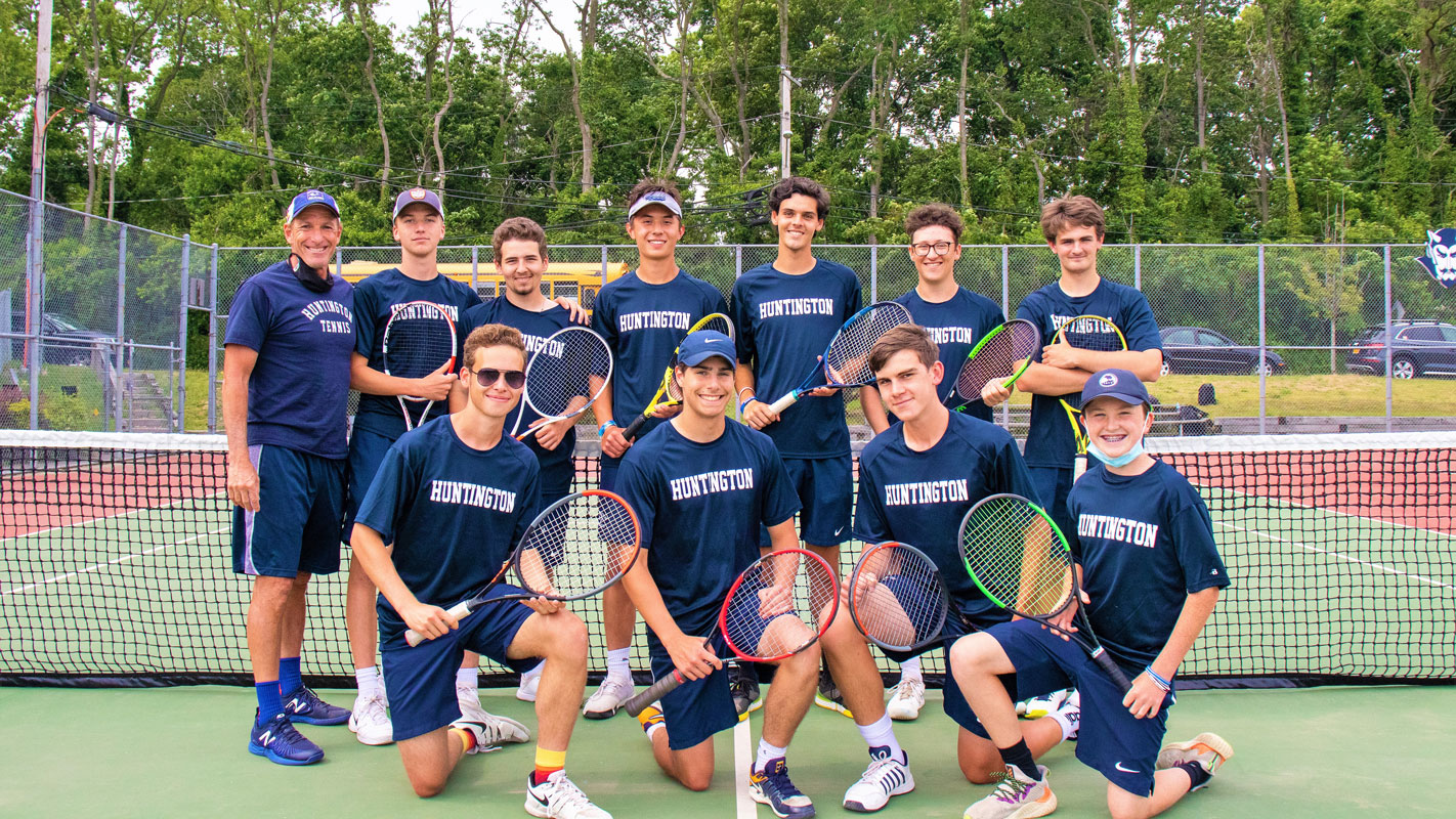 The 2021 Huntington varsity boys' tennis team with head coach Jamie Fishlow.