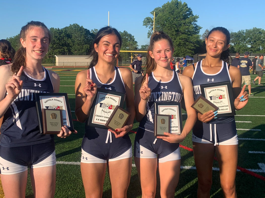 Megan Donaghy, Brianna Halbeisen, Caroline O' Rourke and Analisse Batista after winnning the county relay title