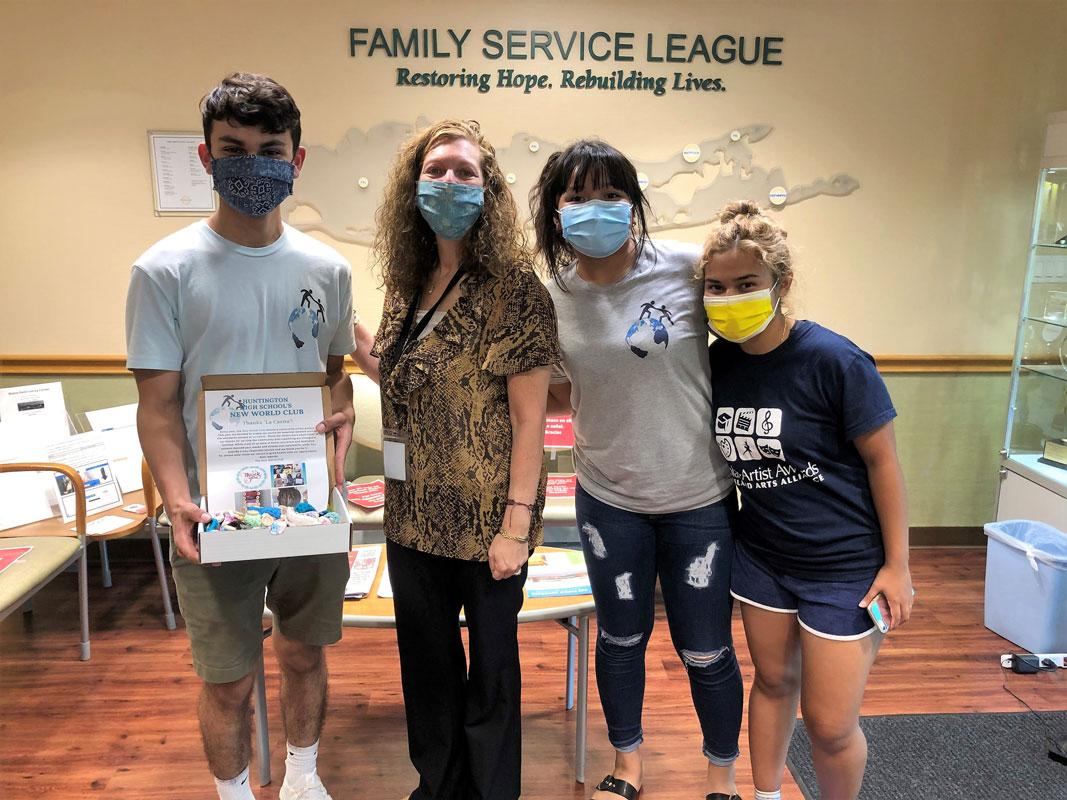 New World Club members at the Family Service League with Lisa Jamison (second from left.)