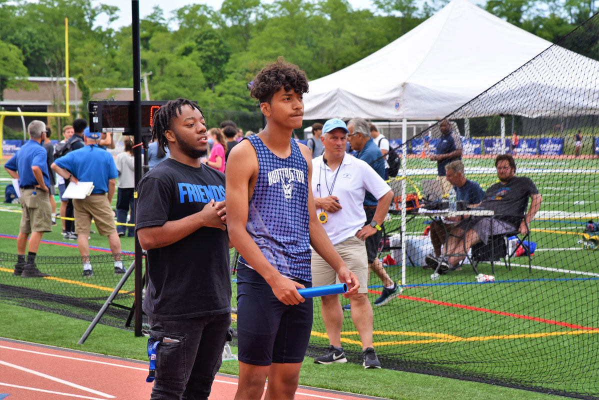 Julio Martinez ponders his race as Nasir Youngblood offers words of encouragement.
