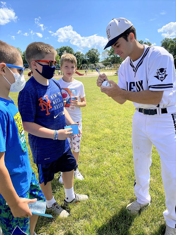 All-County shortstop Chris Segreti signed autographs for the third graders.