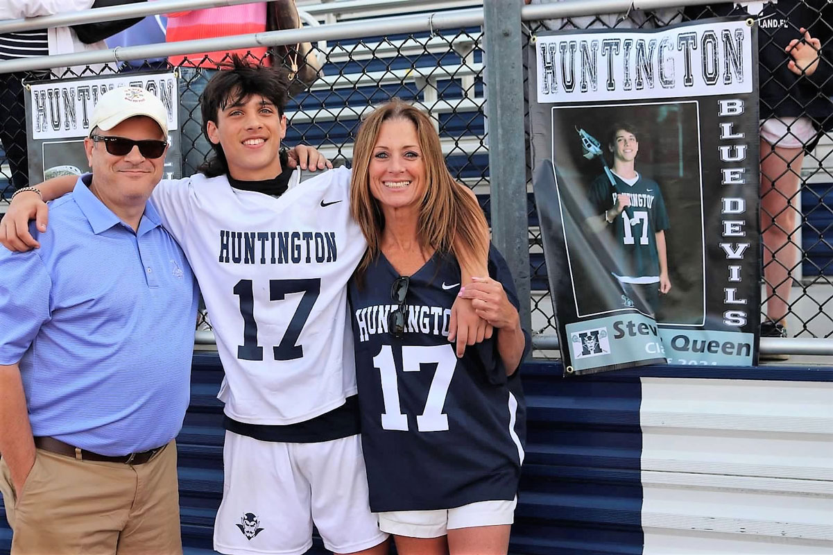 Steve Queen with his family on Blue Devil boys' lacrosse Senior Day.
