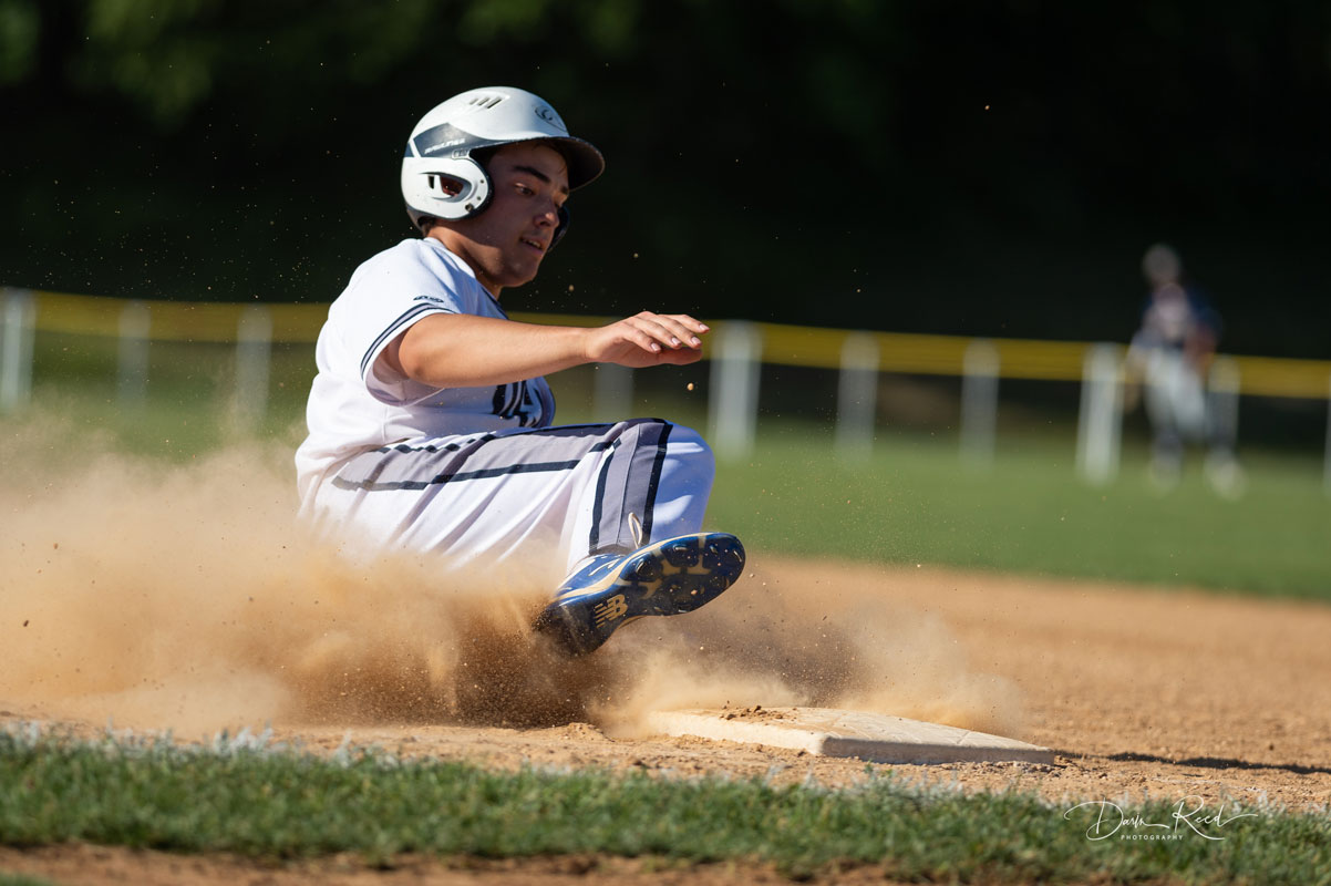 Kyle Colleluori slides safely into third base. (Darin Reed photo.)