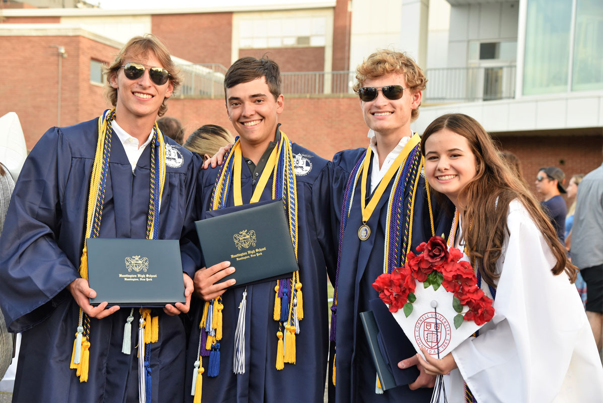 Jack Krisch, Kyle Colleluori, Andrew McKenzie and Chloe Buffone following the commencement exercises.