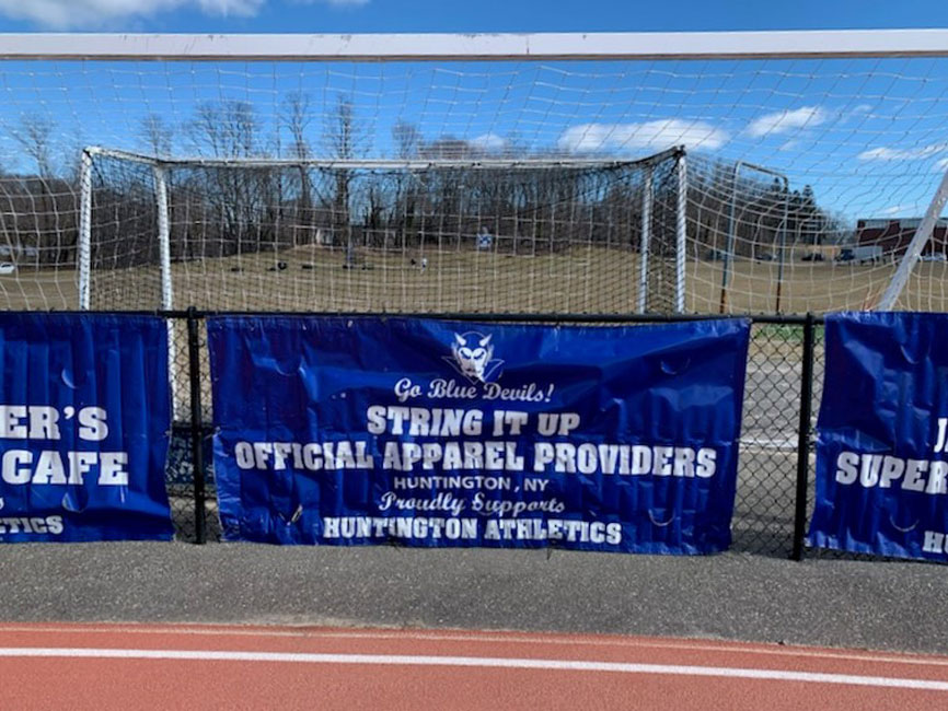 The Huntington Booster Club has begun installing field banners around Blue Devil Stadium