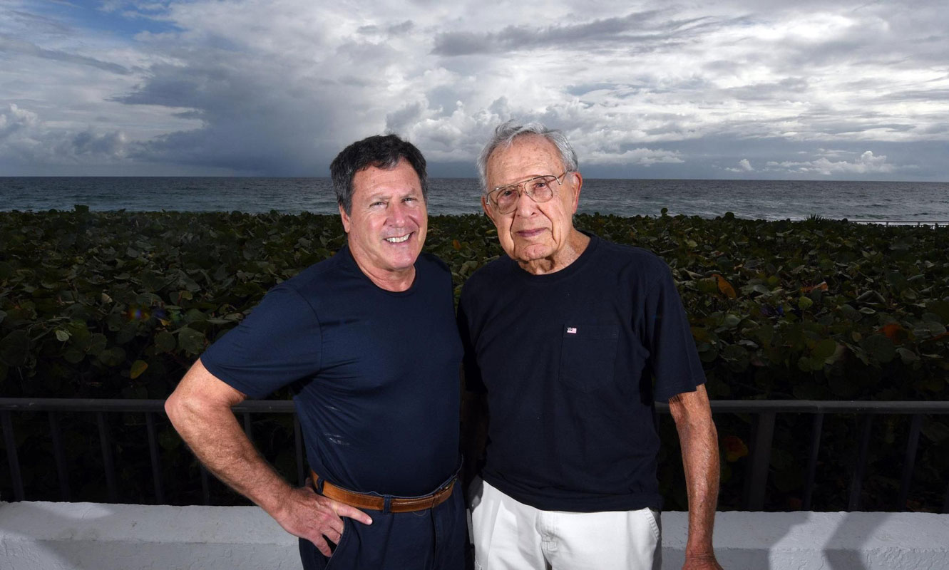 Dr. Frank Field (right) with his son, Storm. A Huntington research team interviewed both meteorologists.