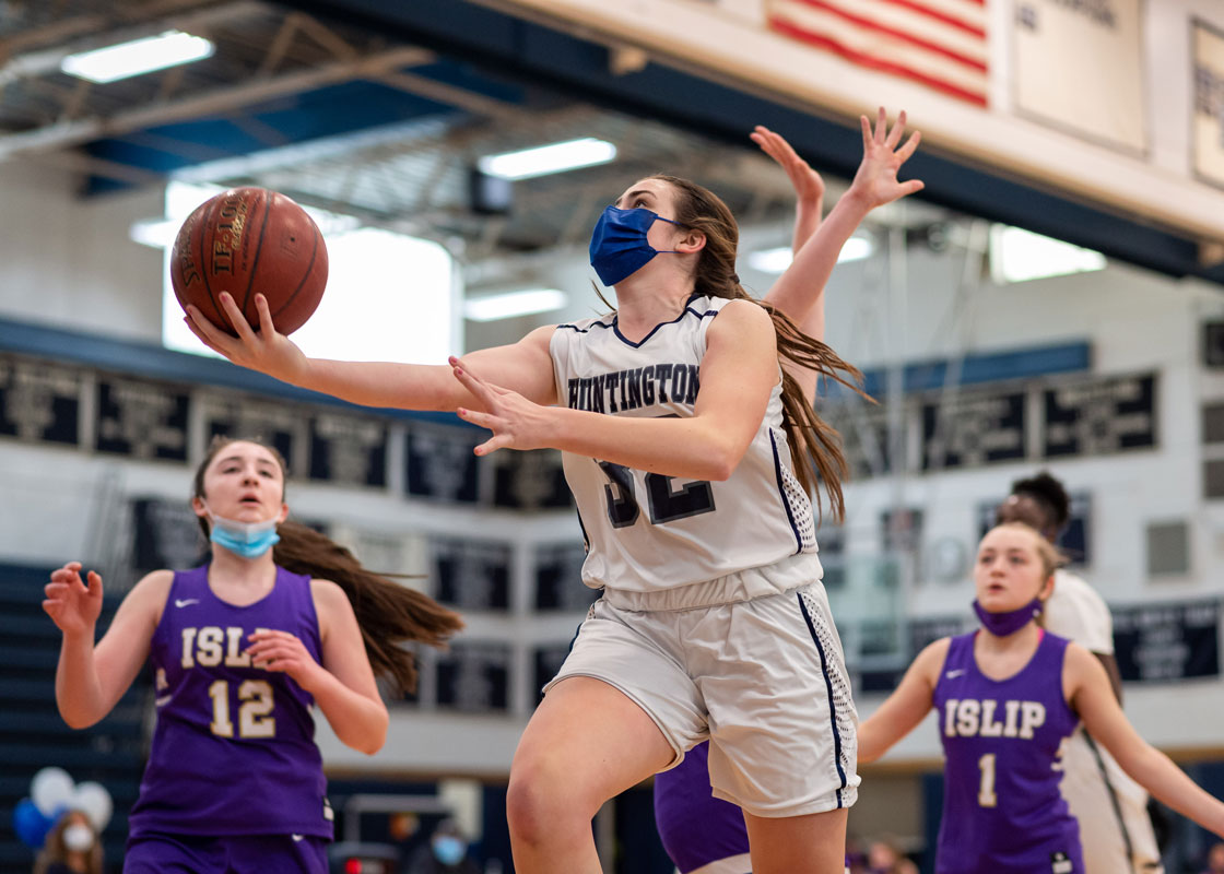 All-County Emily Plachta drives the lane for the Blue Devils. (Darin Reed photo.)