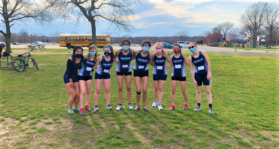 The 2021 Huntington High School girls' cross country runners are set for a race.