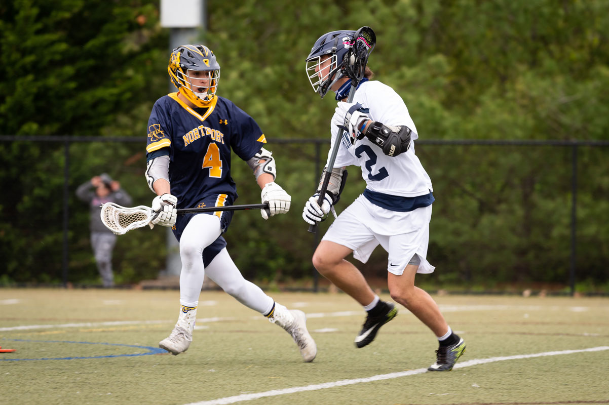 Liam Lennon (right) goes one on one against Northport. (Darin Reed photo (1)