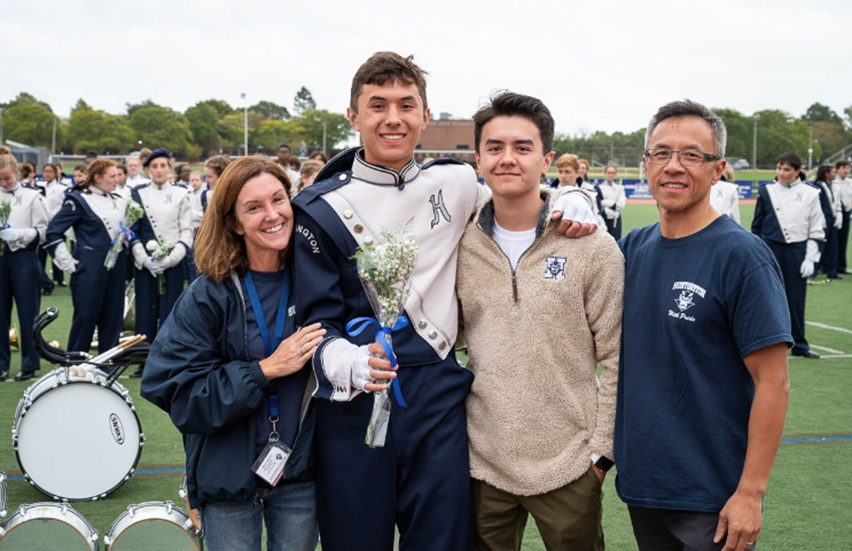 Aaron Chin and his family at a Blue Devil marching band event.