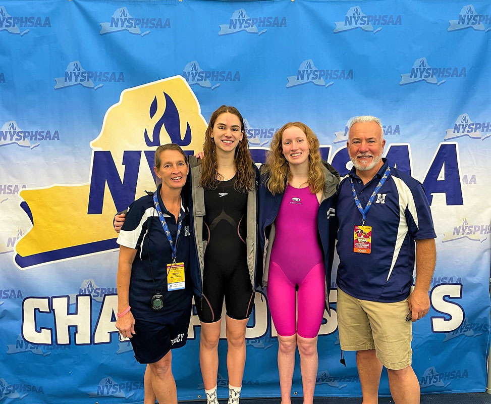 Kathryn Montefusco and Caelan Clayton are flanked by Meg McConnell and Chris Helmke.