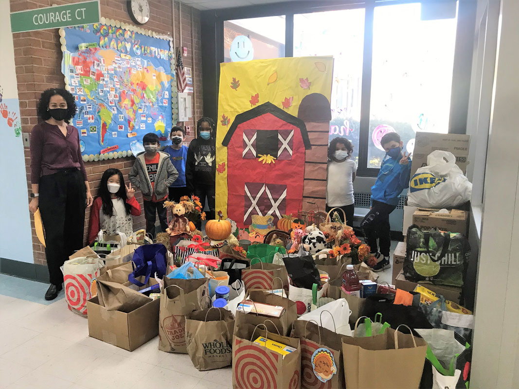 Flower Hill students posed with some of the items to be donated.