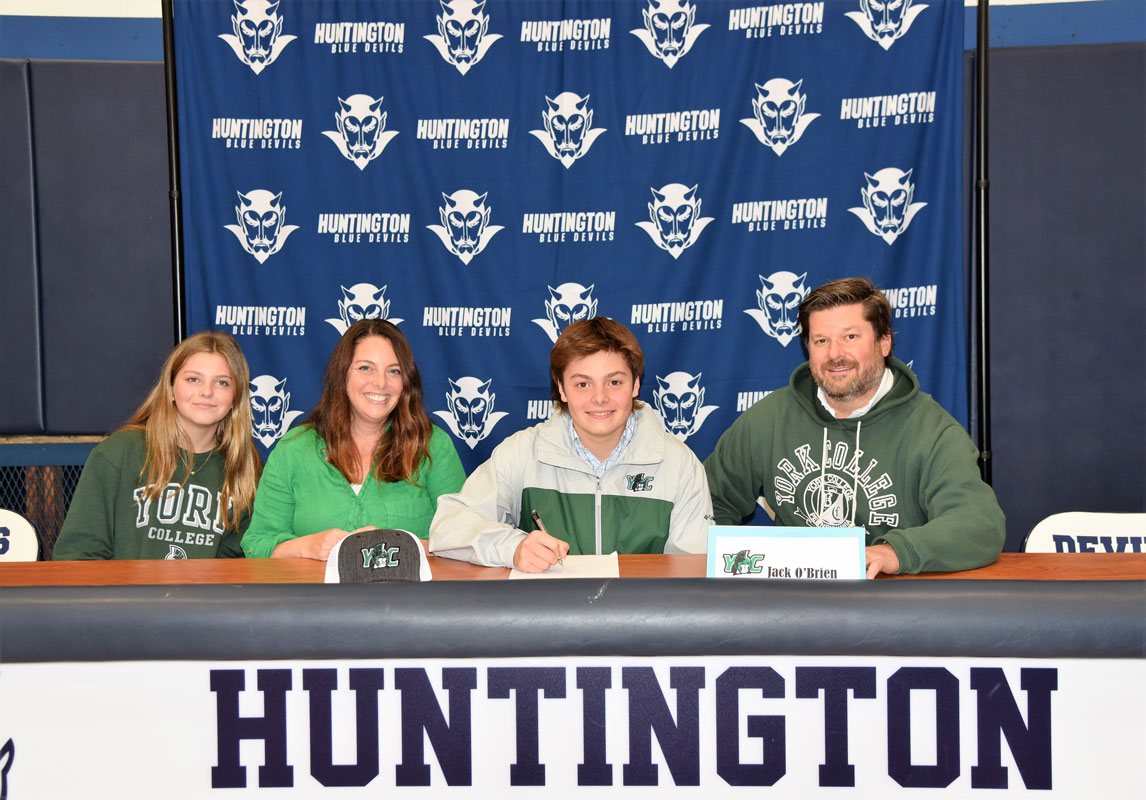 Huntington's Jack O'Brien with his family as he committed to York College