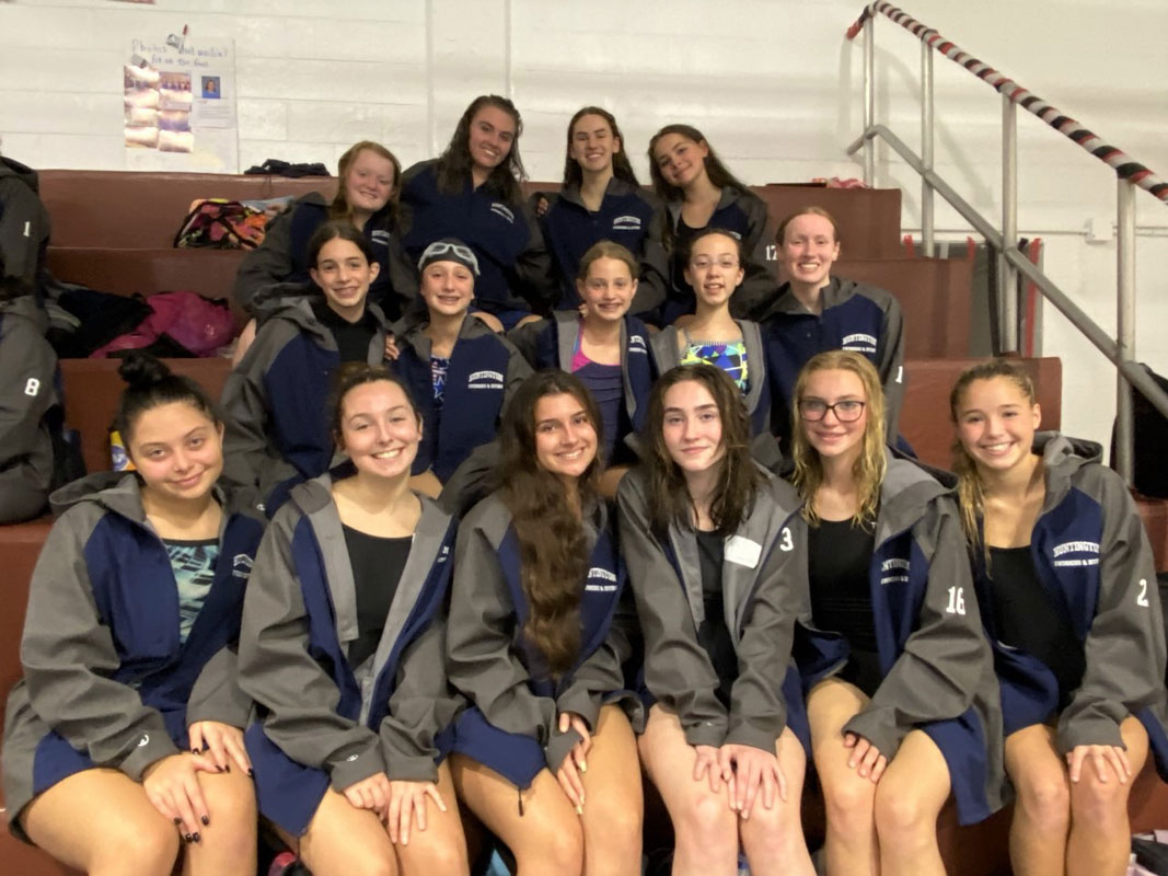 The 15 member strong Huntington girls' swimming and diving team.