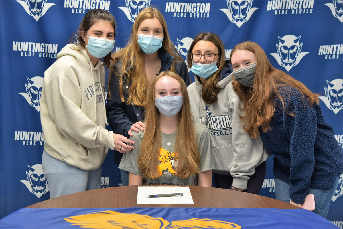 Shannon Kehoe is surrounded by her friends and teammates after signing a letter of intent.