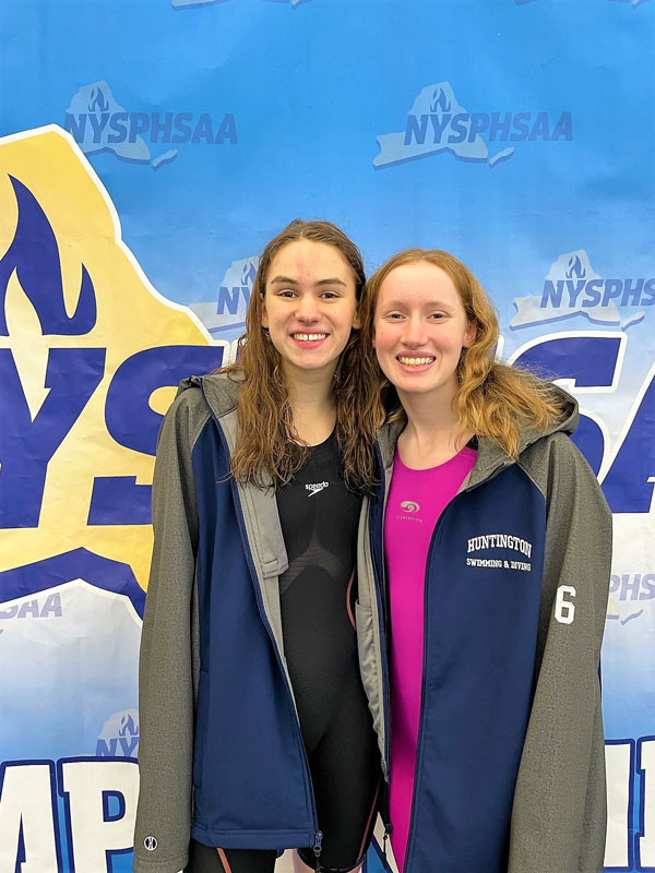 Kathryn Montefusco and Caelan Clayton at the state swimming and diving championships.