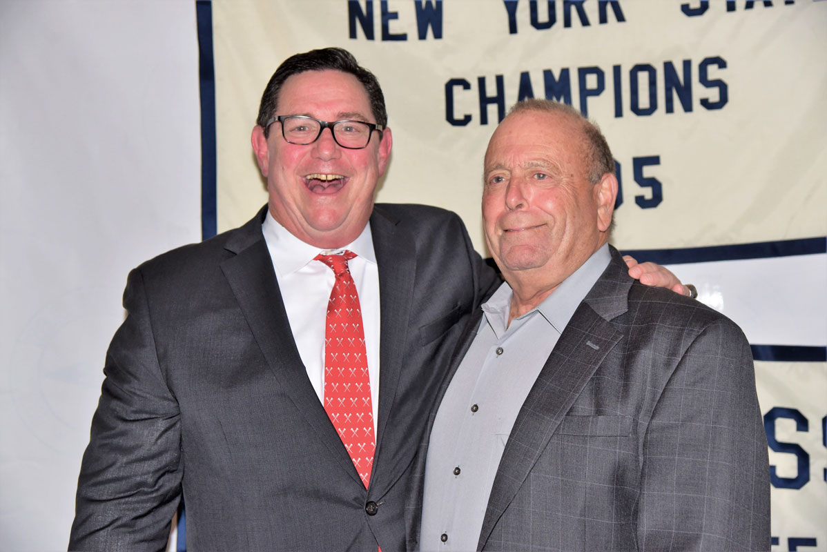 Paul McDermott (left) with former Blue Devil lacrosse coach Steve Davis.