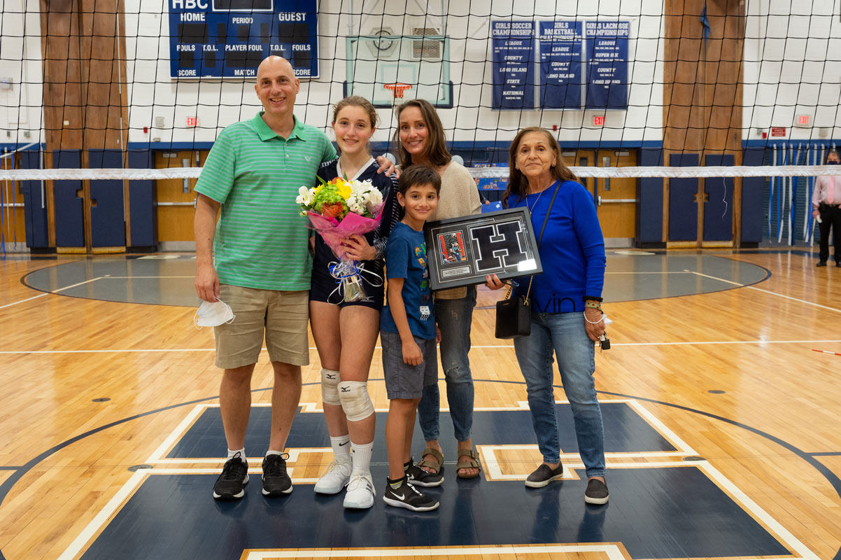 Senior Kianna Criscuola with her family on Senior Day. (Darin Reed photo.)