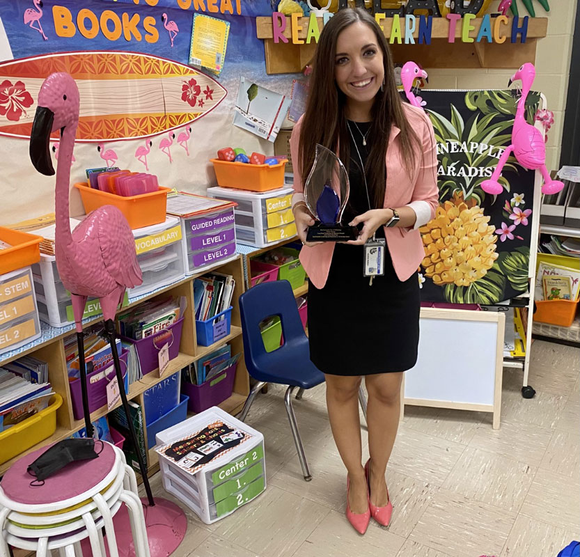 Valerie Murray with her award in her Southdown School classroom.