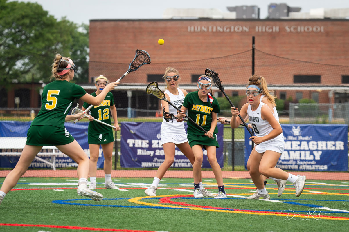 Katie Browne and Laurel Bonn are on the ball for the Blue Devils. (Darin Reed photo.)