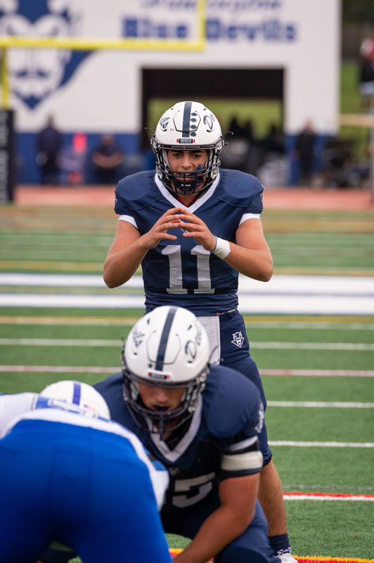 Junior quarterback Anthony Annuniziata calls the play. (Darin Reed photo.)