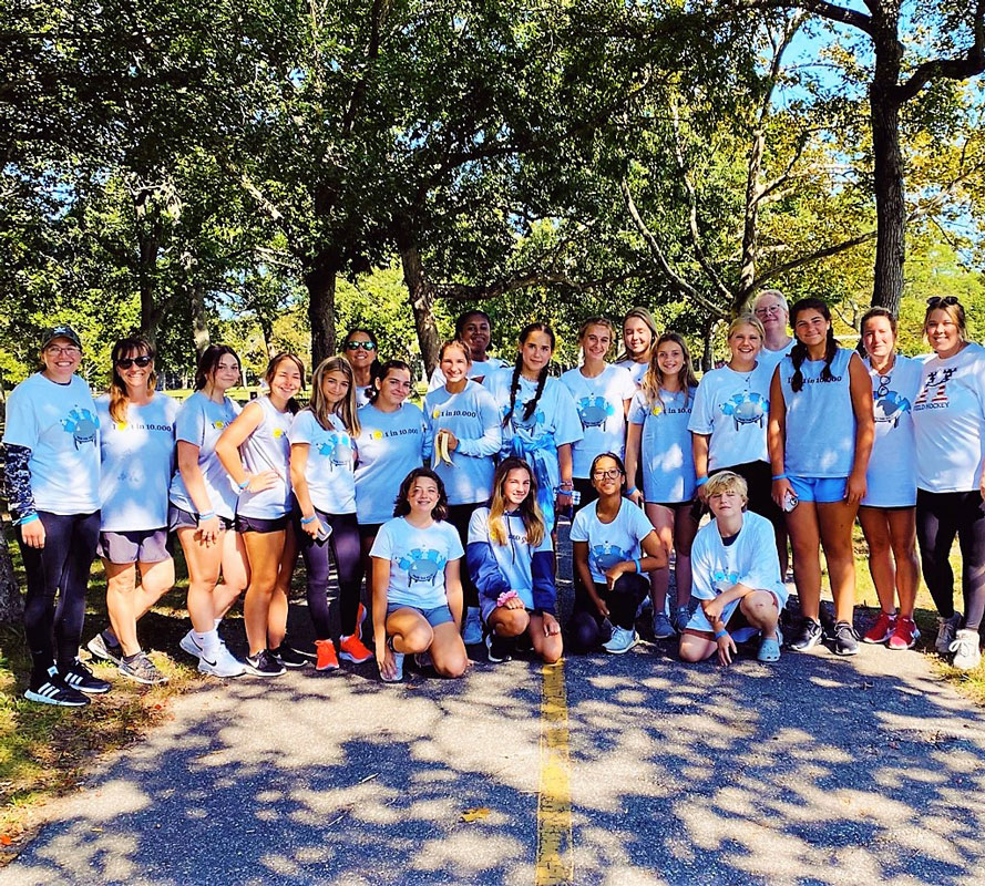Huntington High School field hockey players participated in a charitable walk at Heckscher State Park.