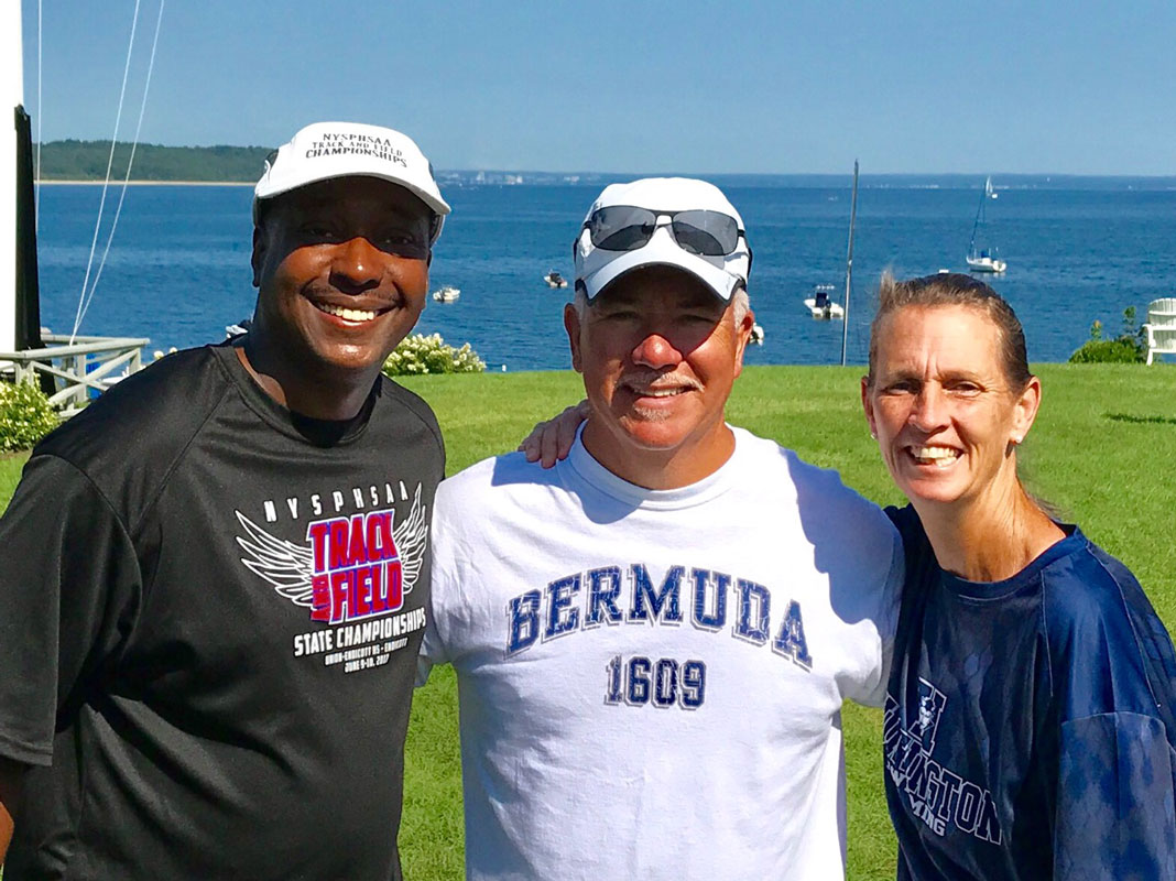  Huntington head coach Chris Helmke is flanked by Rufus Shepard and Meg McConnell. 