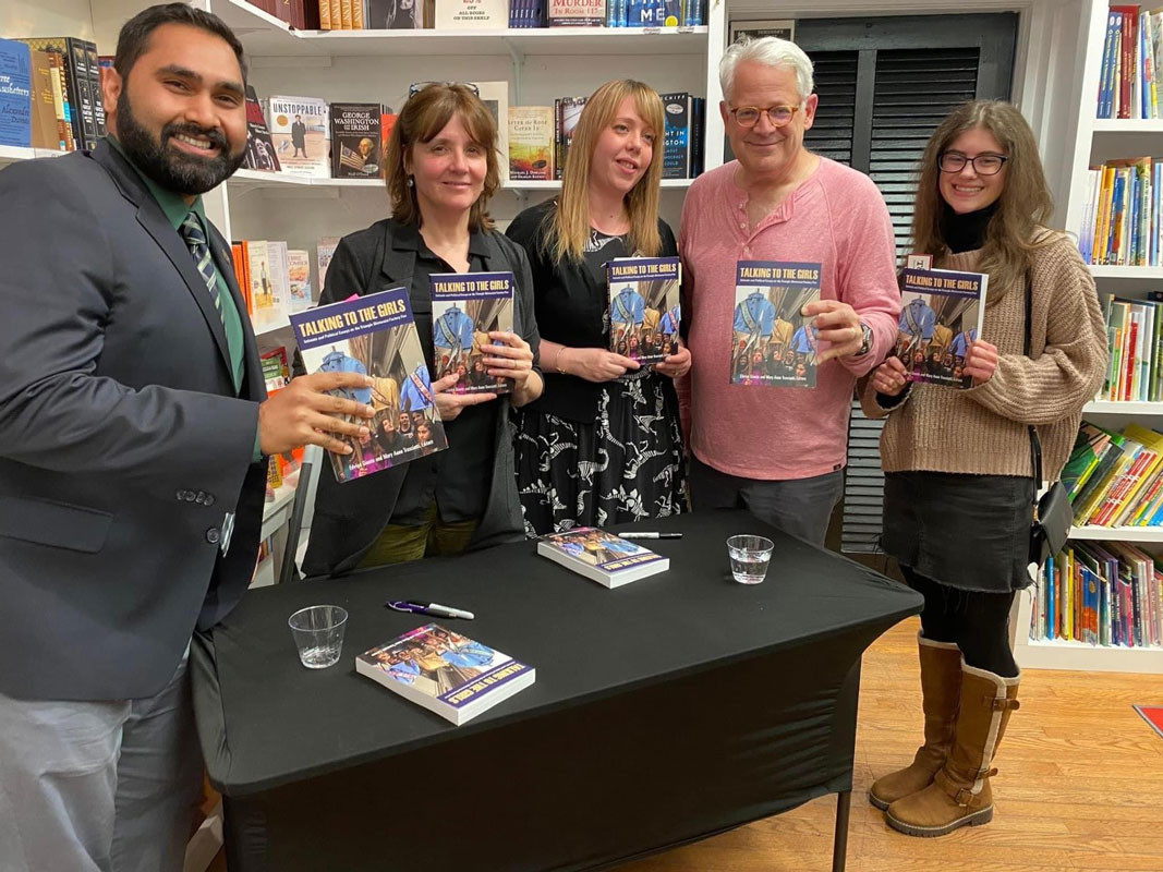 Finley teacher Kim Schiller (center) is now a published author.
