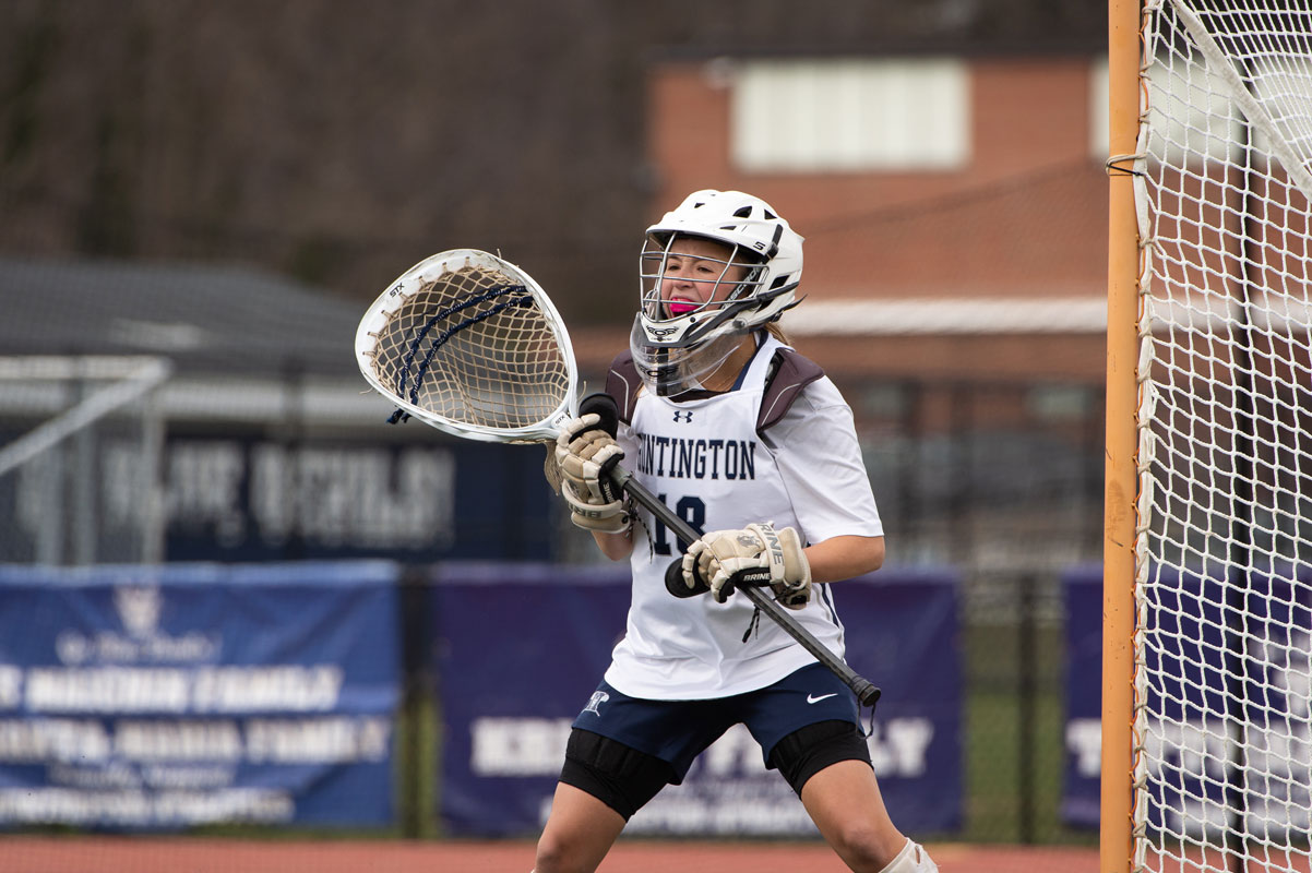 Senior Ainsley Proctor in goal for the Blue Devils. (Darin Reed photo.)